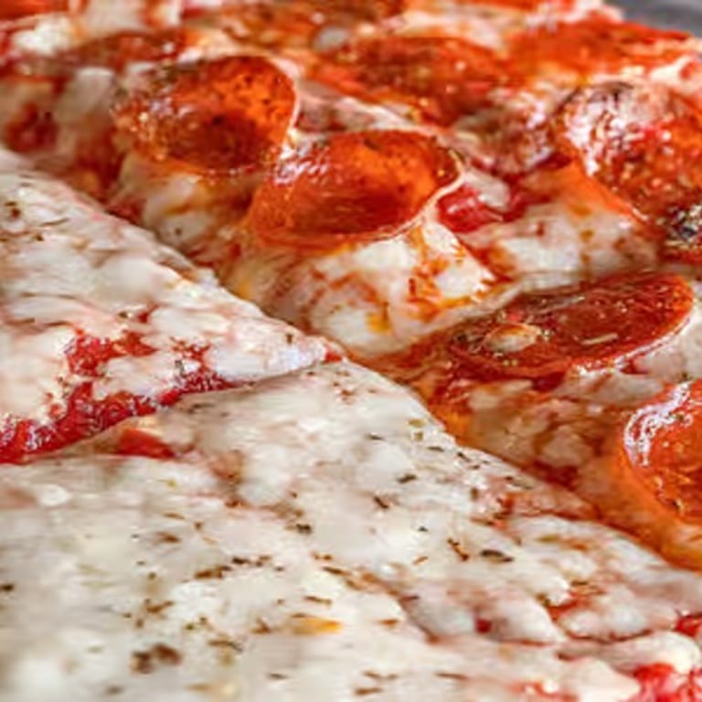 Indulge in Our Deep Dish Pizza